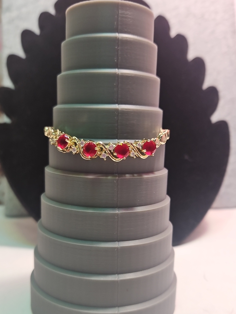 Gold Bracelet with Red Gemstones